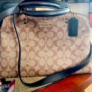 Coach medium size bag with large straps also.